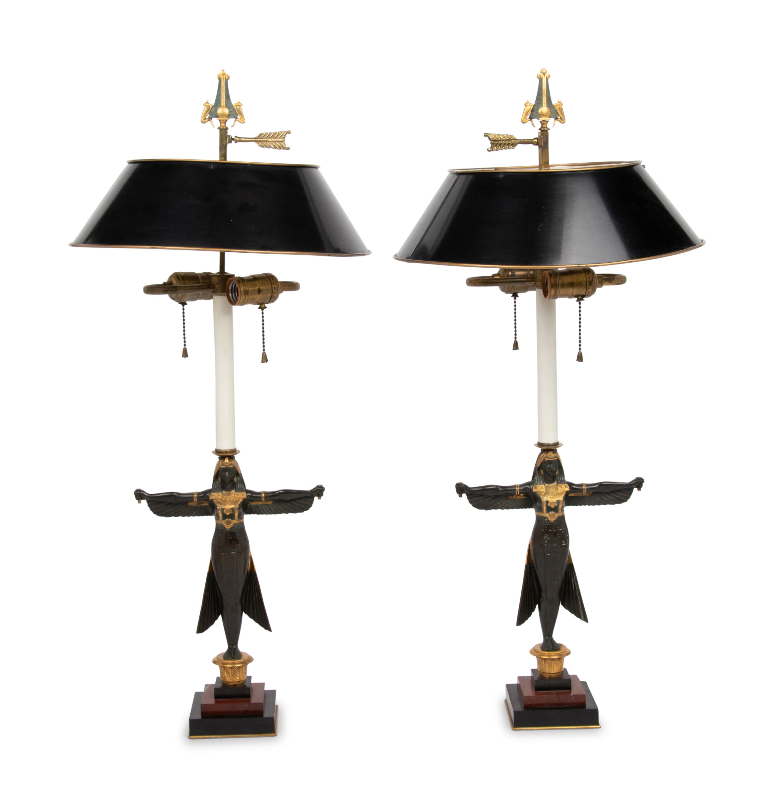 A Pair of Egyptian Revival Parcel Gilt Bronze Figures Mounted as Lamps with Tole Shades