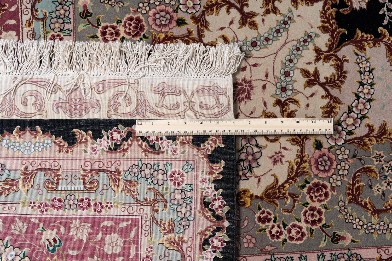 A Tabriz Wool and Silk Rug