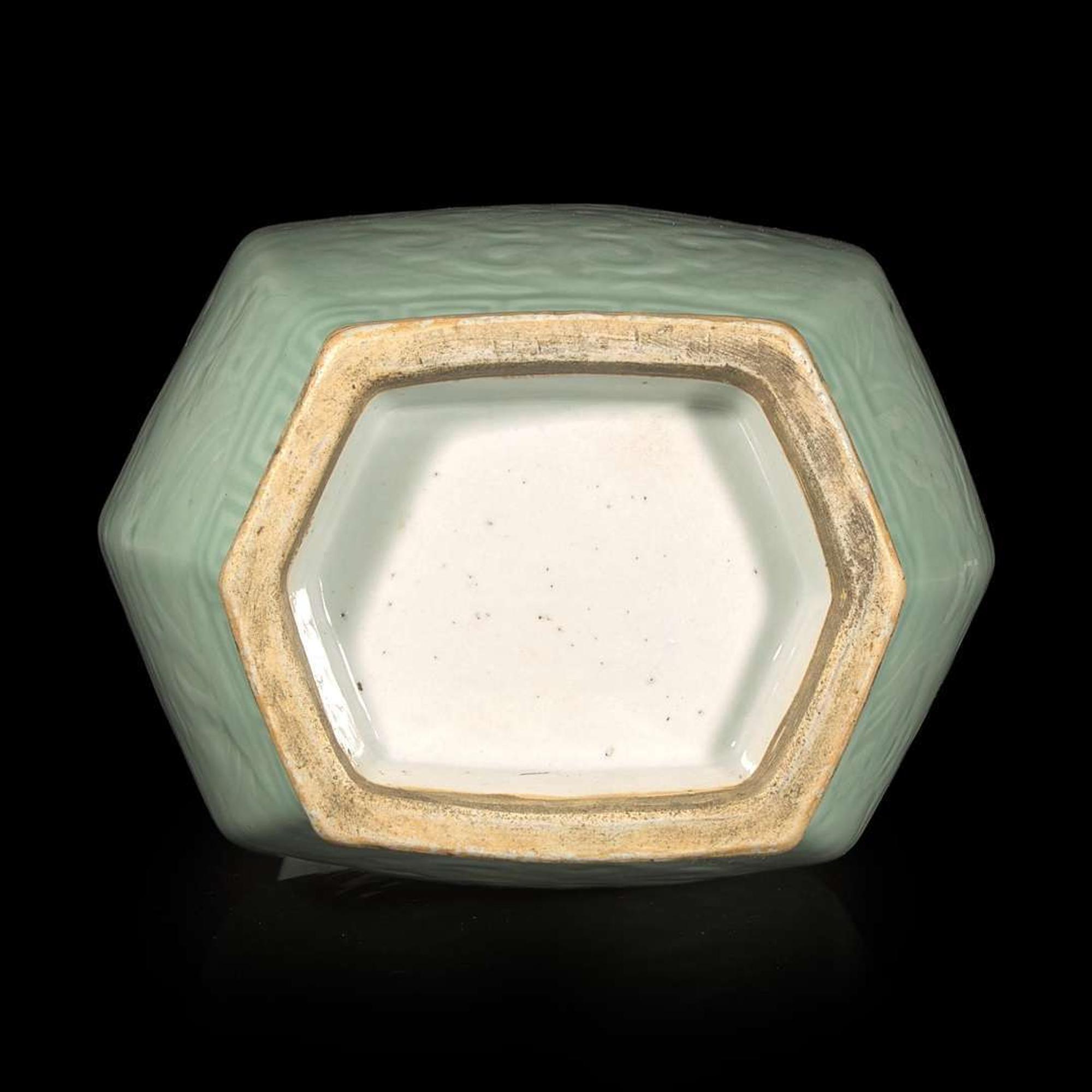 A Chinese celadon-glazed hexagonal baluster vase 青釉双耳六方瓶