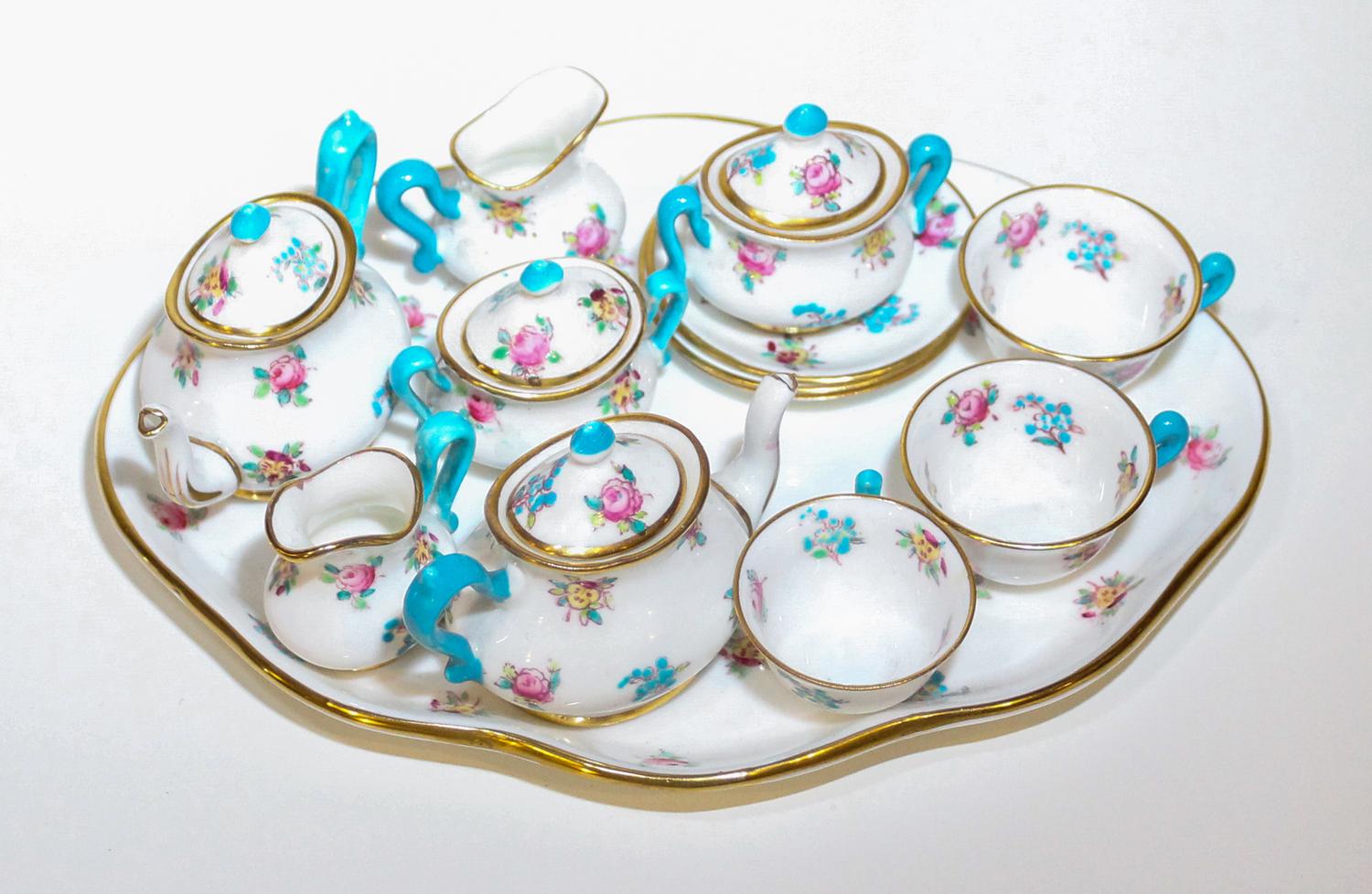 A Coalport Diminutive Tea Service. Width of tray 7 1/2 inches.