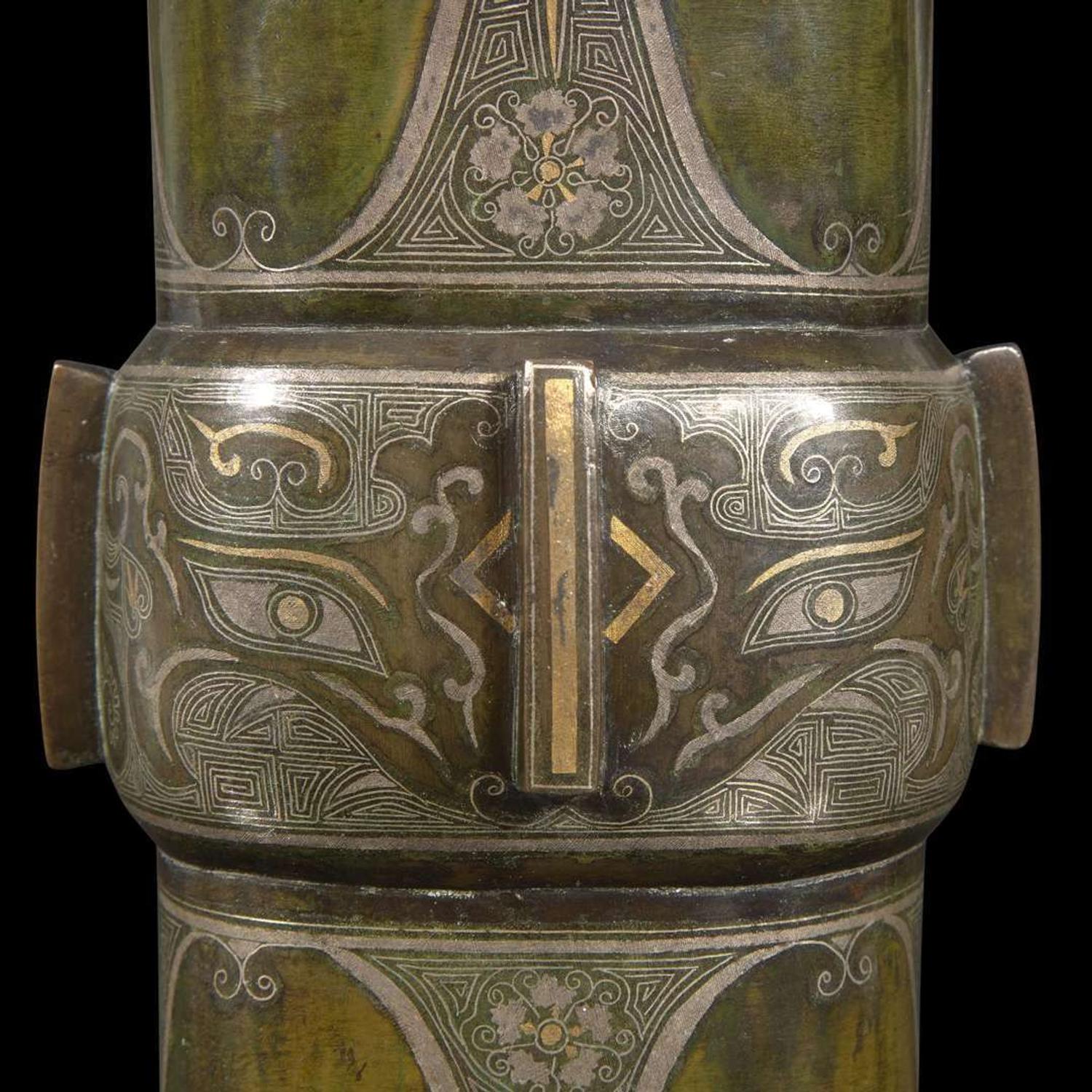A gold and silver-inlaid and patinated bronze archaistic gu-form vase 金银象嵌加漆觚