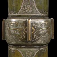 A gold and silver-inlaid and patinated bronze archaistic gu-form vase 金银象嵌加漆觚