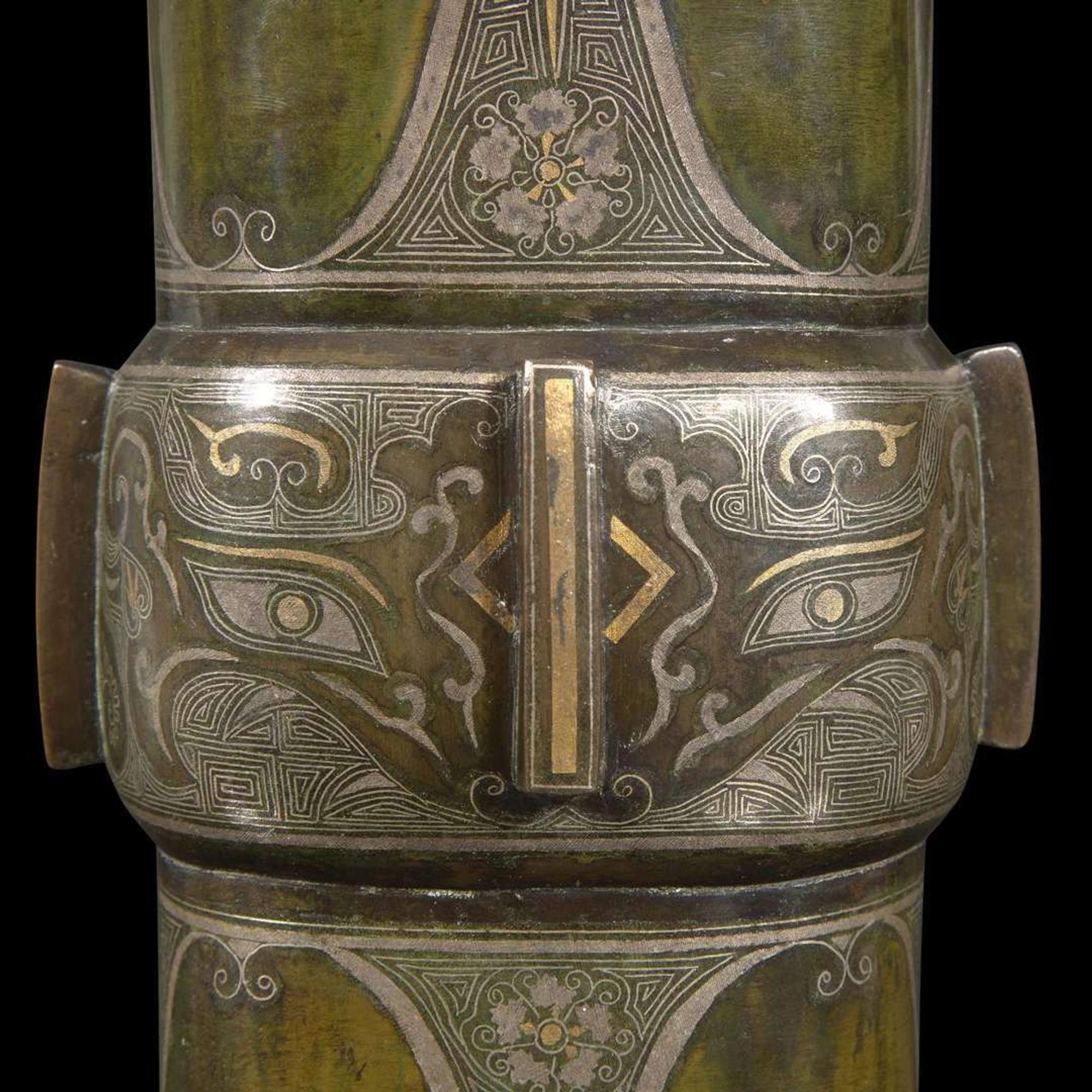 A gold and silver-inlaid and patinated bronze archaistic gu-form vase 金银象嵌加漆觚