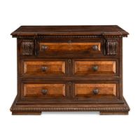 An Italian Carved Walnut Chest of Drawers