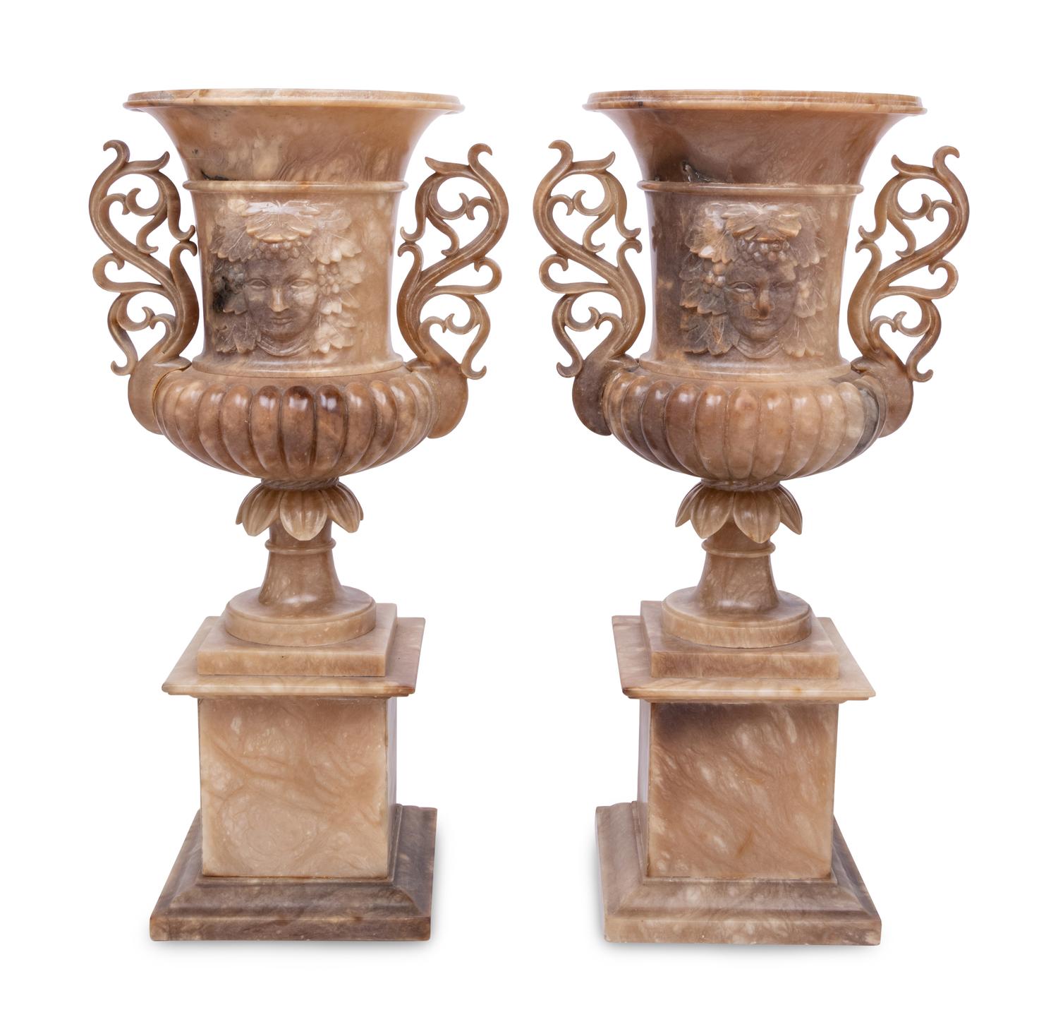 A Pair of Carved Alabaster Urns
