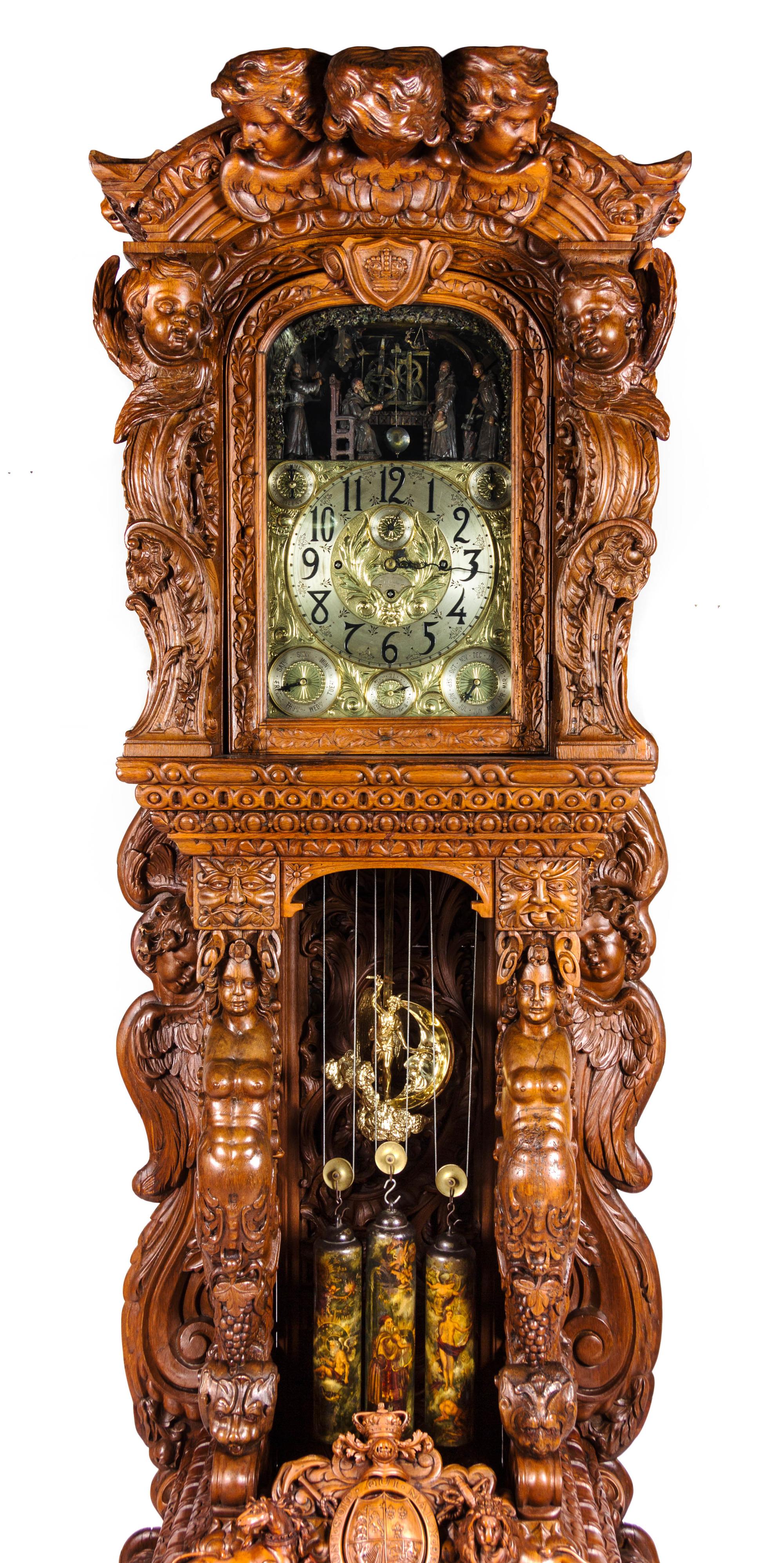 A Monumental English Carved Oak Tall Case Clock, LAST QUARTER 19TH CENTURY, Height 130 1/2 x width 48 x depth 33 inches. — LAST QUARTER 19TH CENTURY,