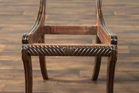 A Pair of Classical Drapery Carved Mahogany Side Chairs