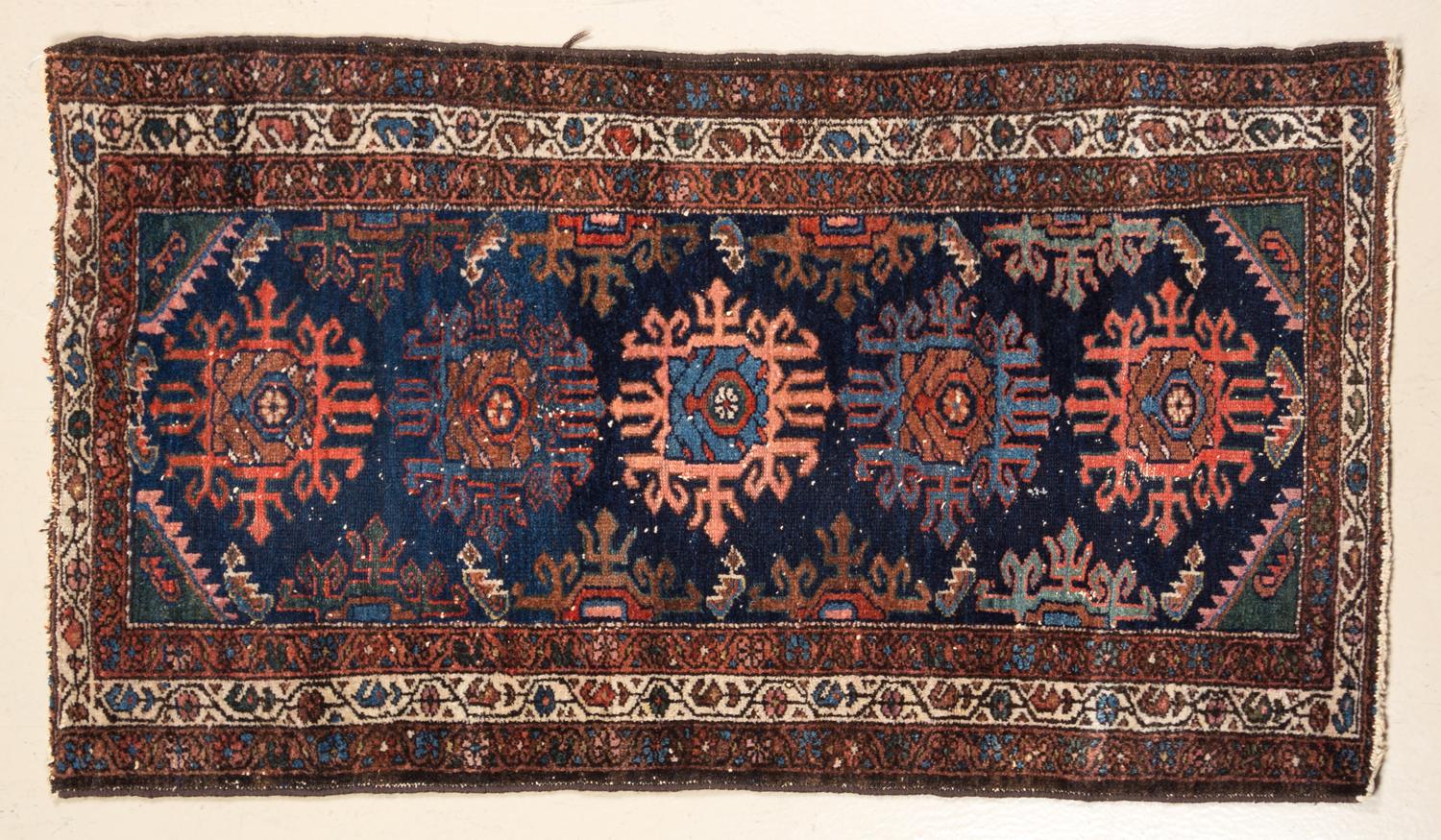 A Northwest Persian Rug 4 feet 4 inches x 2 feet 7 inches.