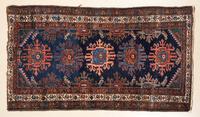 A Northwest Persian Rug 4 feet 4 inches x 2 feet 7 inches.