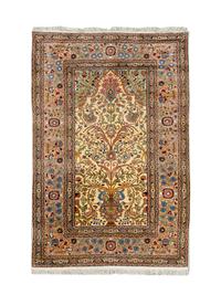 A Hereke Silk Prayer Rug — 20TH CENTURY