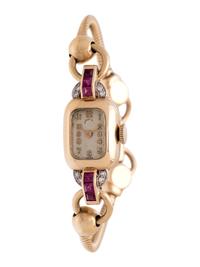 CRESARROW, SHREVE & CO., 14K YELLOW GOLD, SYNTHETIC RUBY AND DIAMOND WRISTWATCH