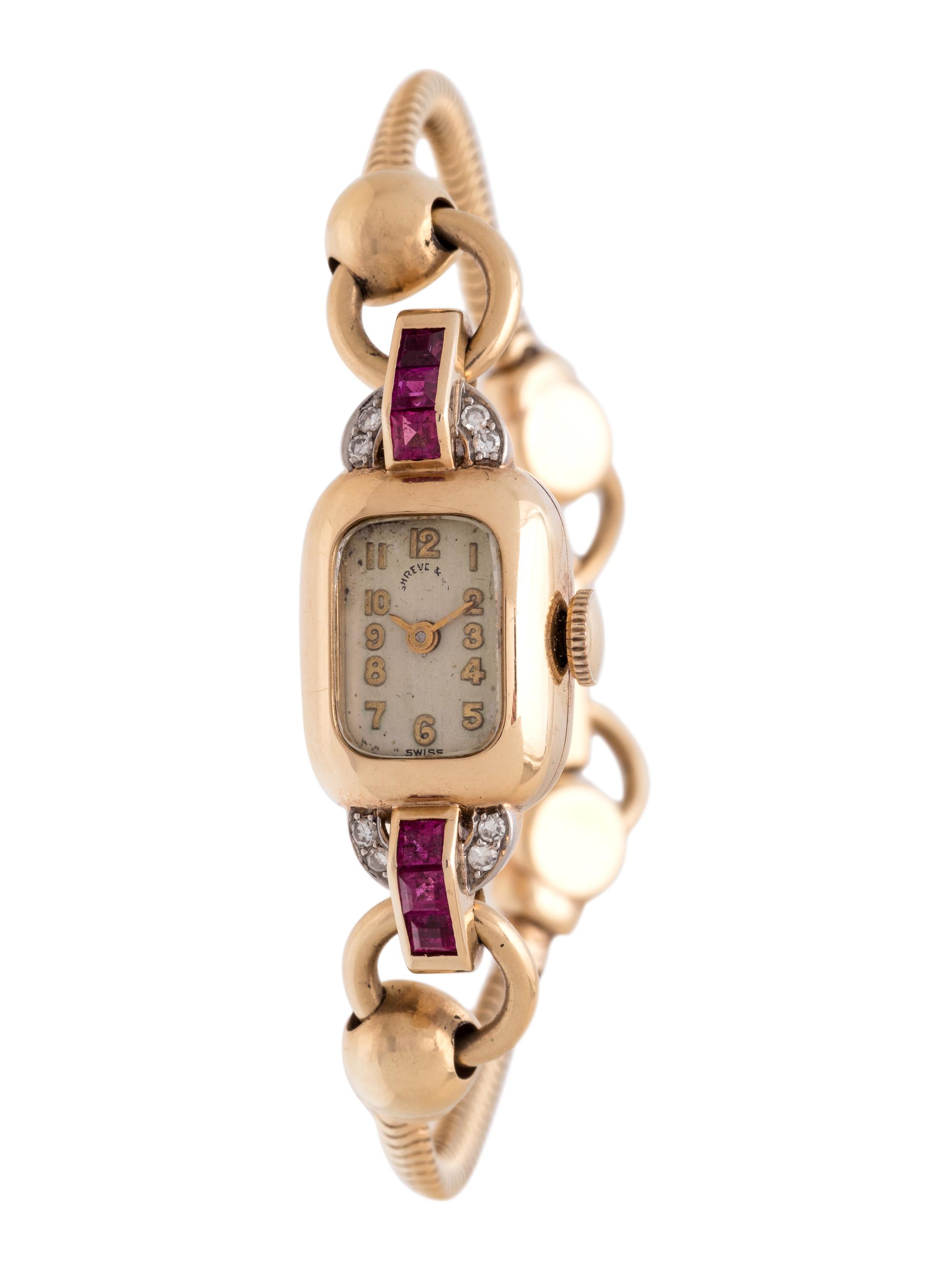 CRESARROW, SHREVE & CO., 14K YELLOW GOLD, SYNTHETIC RUBY AND DIAMOND WRISTWATCH
