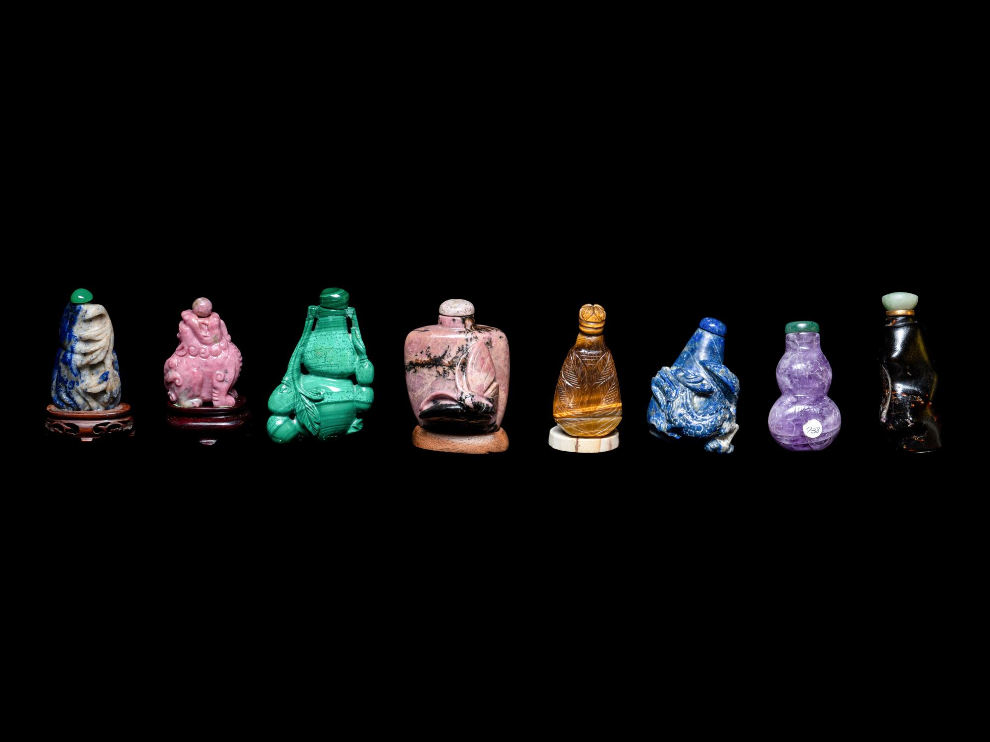 Eight Chinese Precious Stone and Lacquered Snuff Bottles