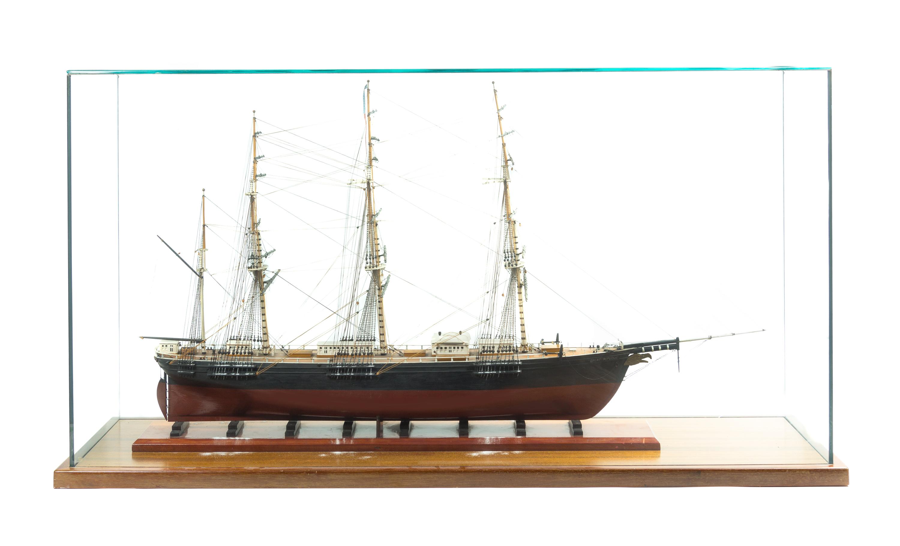 An American Carved Wood and Fabric Ship Model, Width of case 49 1/4 inches.