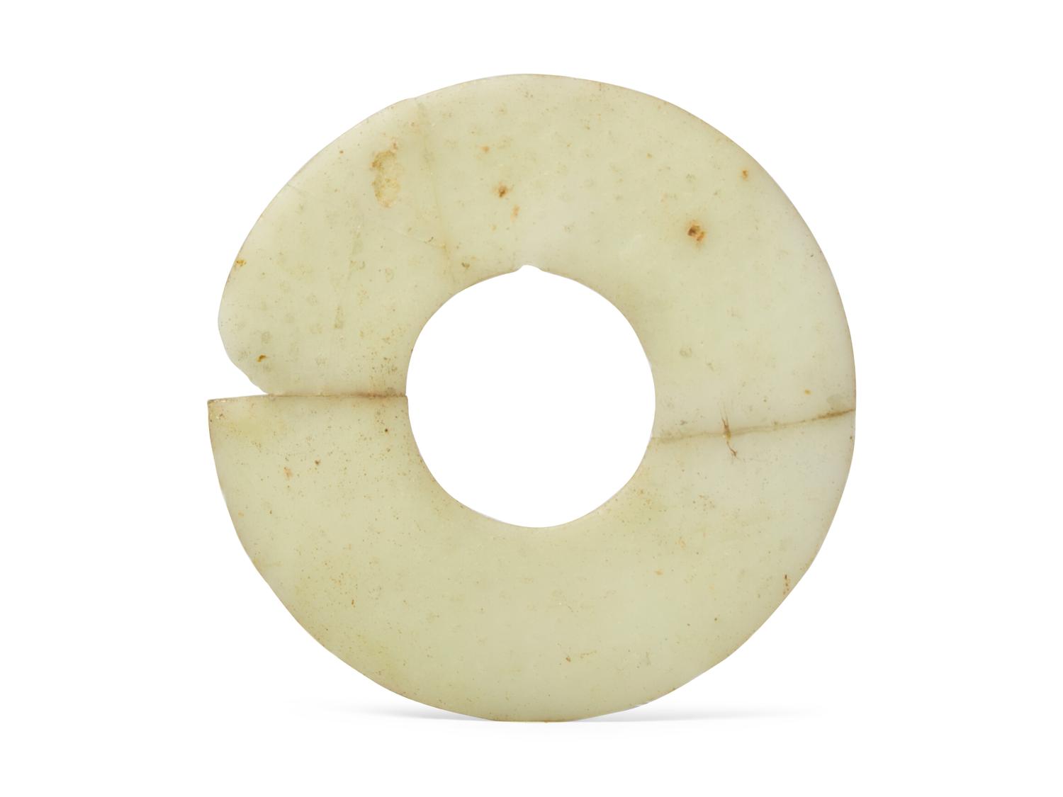 A Chinese Molded White Glass Bi-disc, Possibly Han Dynasty (202 BC. - 220 AD.) 或漢 琉璃璧