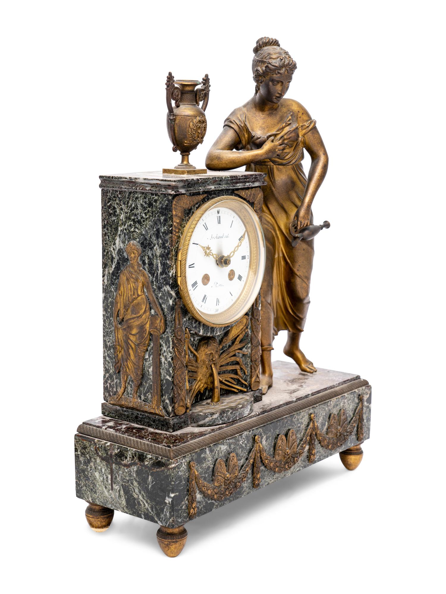 An Empire Style Gilt Metal and Marble Figural Mantel Clock
