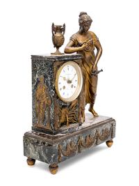 An Empire Style Gilt Metal and Marble Figural Mantel Clock