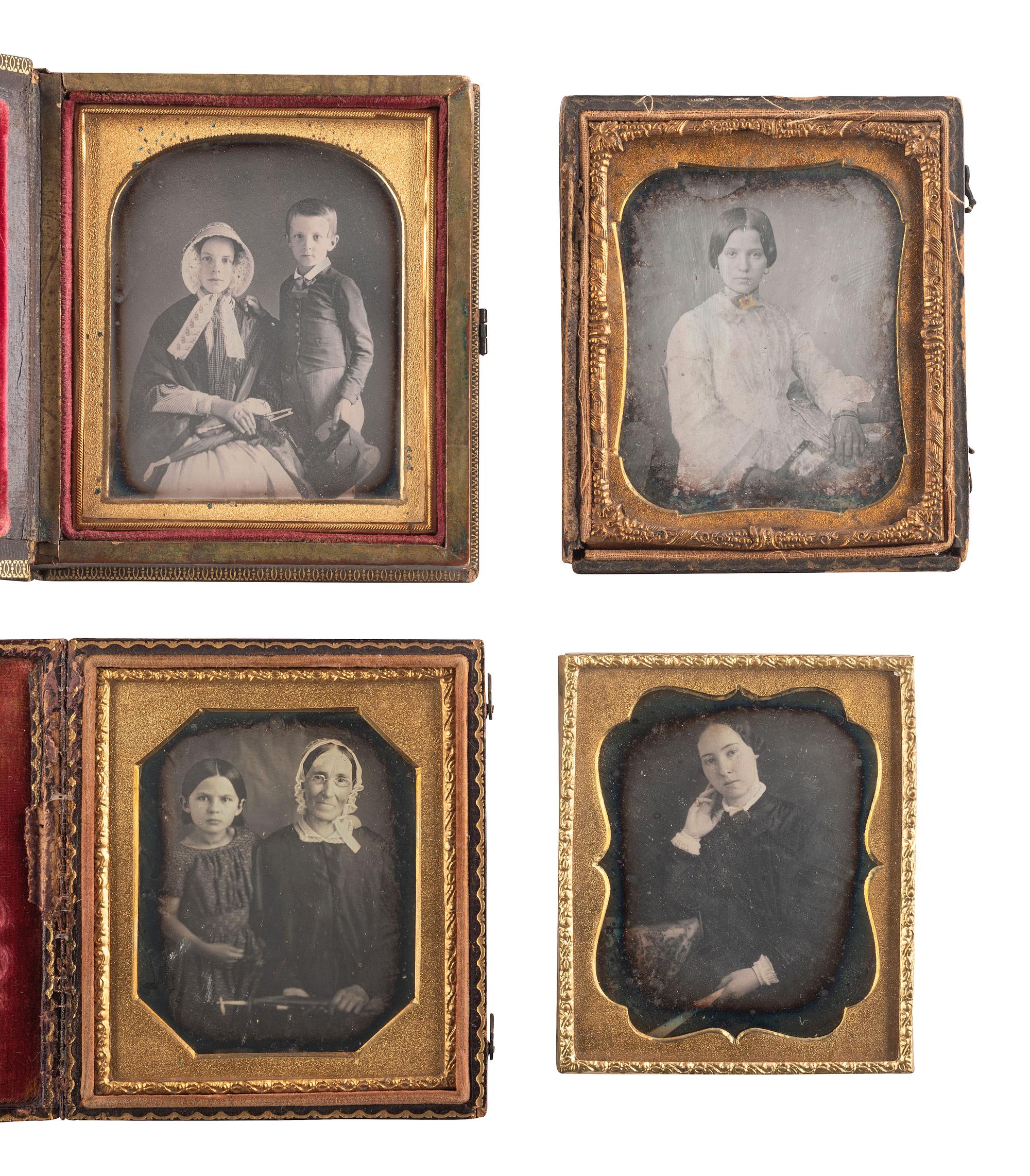 [EARLY PHOTOGRAPHY]. A group of 13 daguerreotype portraits of women holding fans and parasols, highlighted by two half plate examples, including: