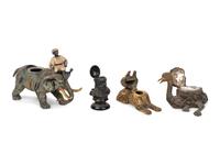 Four Continental Cast Metal Inkwells