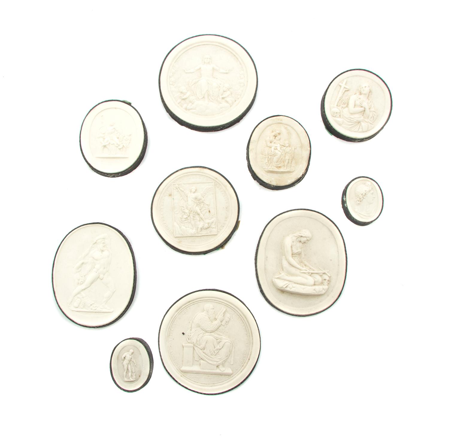 A Collection of Grand Tour Plaster Intaglios, Diameter of largest 2 3/4 inches.