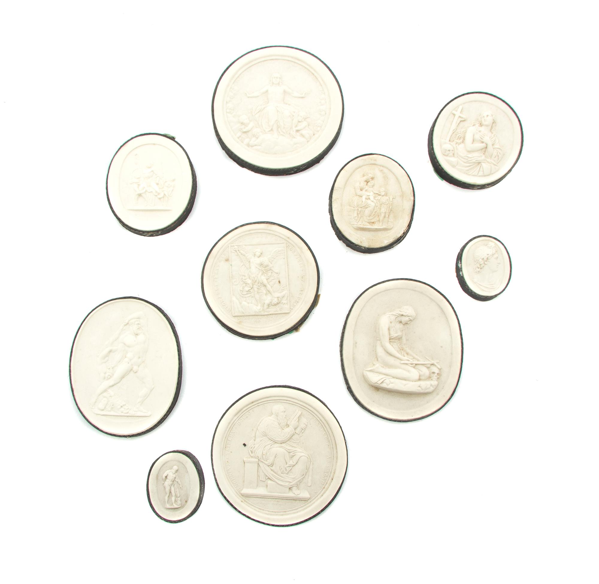 A Collection of Grand Tour Plaster Intaglios, Diameter of largest 2 3/4 inches.