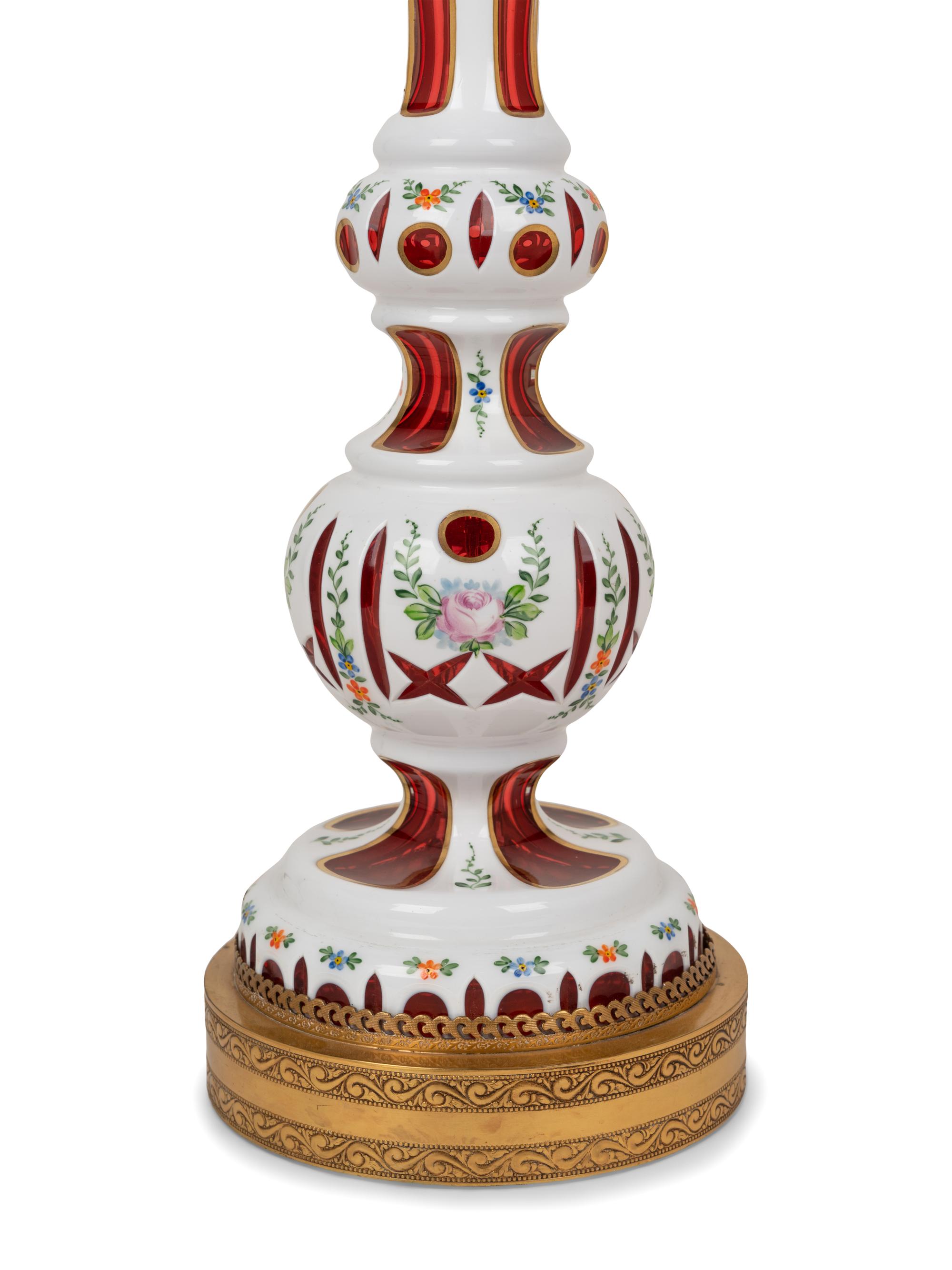 A Pair of Bohemian Enameled White Overlay Ruby Glass Lamps