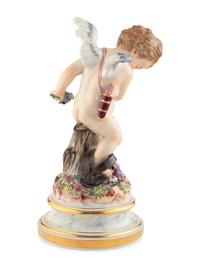 A Meissen Porcelain Putto Figure