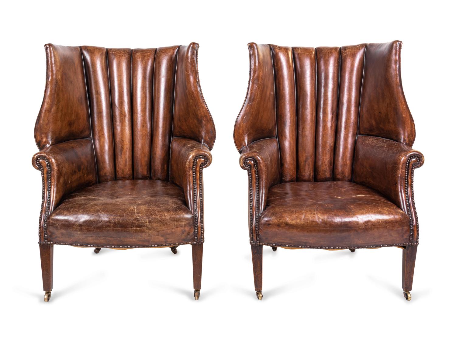 A Pair of Edwardian Leather-Upholstered Wingback Armchairs