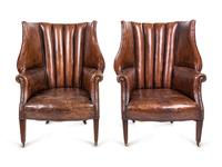 A Pair of Edwardian Leather-Upholstered Wingback Armchairs