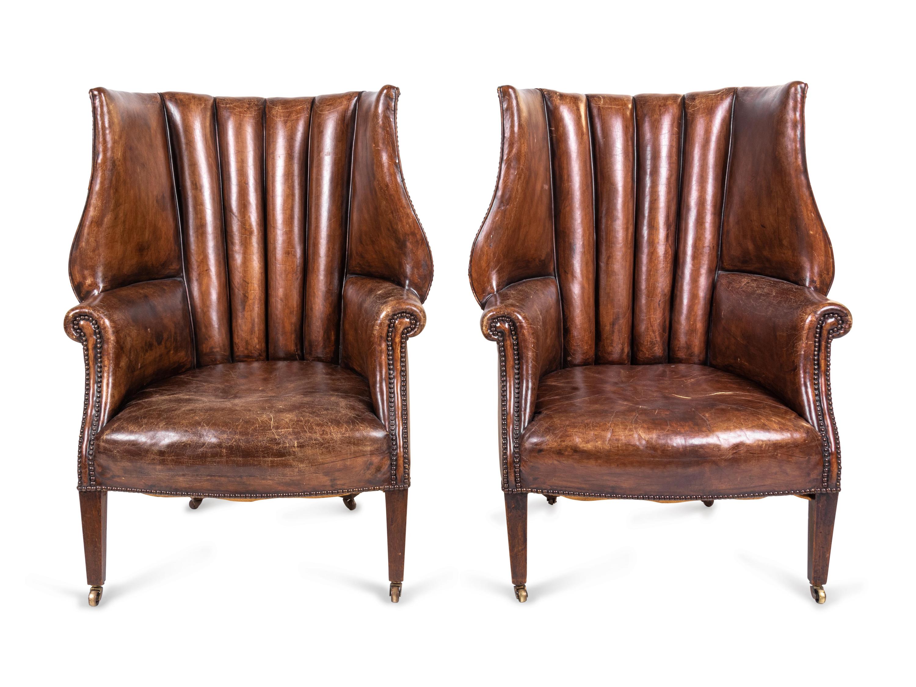 A Pair of Edwardian Leather-Upholstered Wingback Armchairs