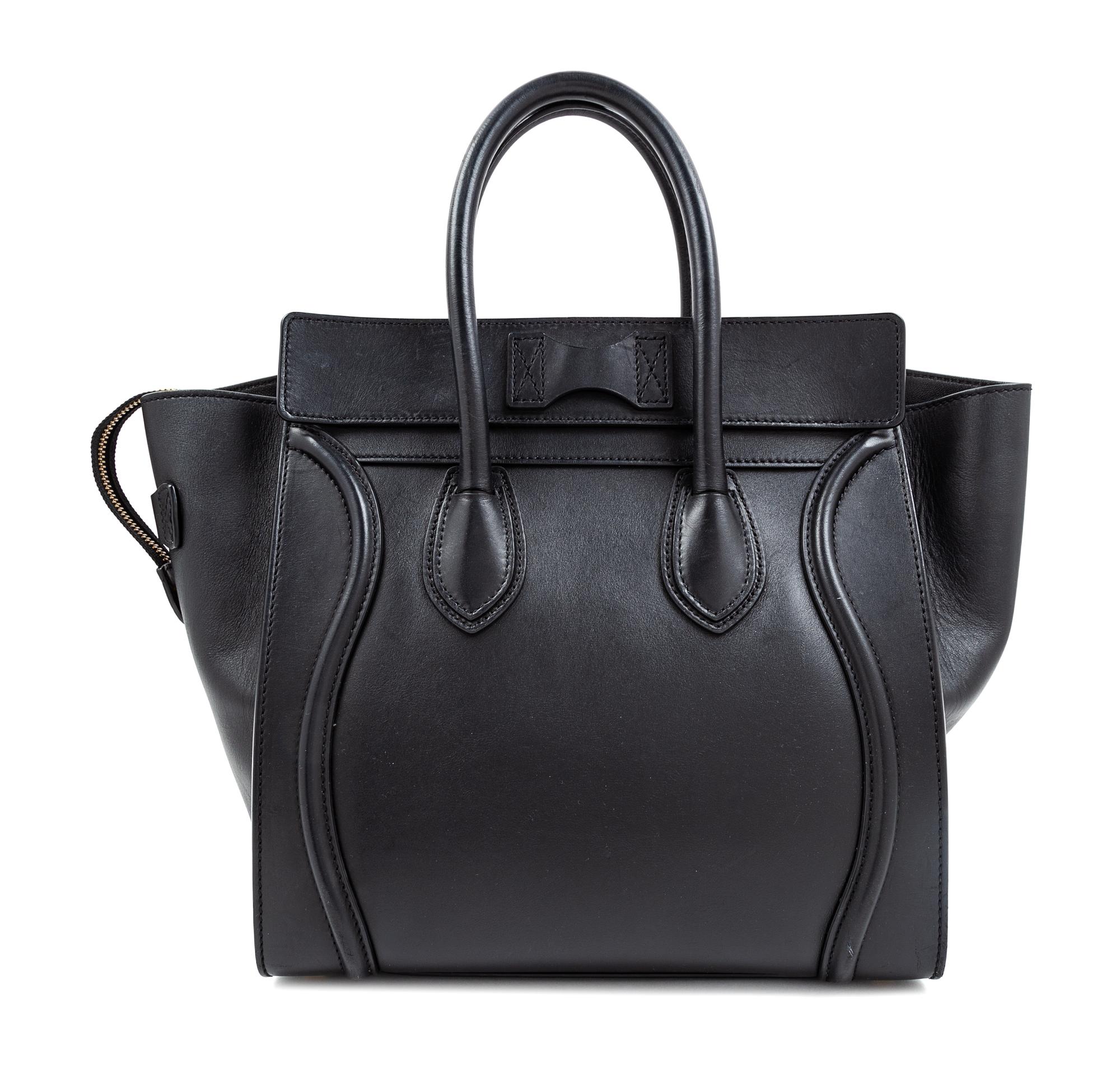A Celine Black Smooth Leather Luggage Tote Bag, 12" H x 12" W x 7" D; Handle drop: 6".
