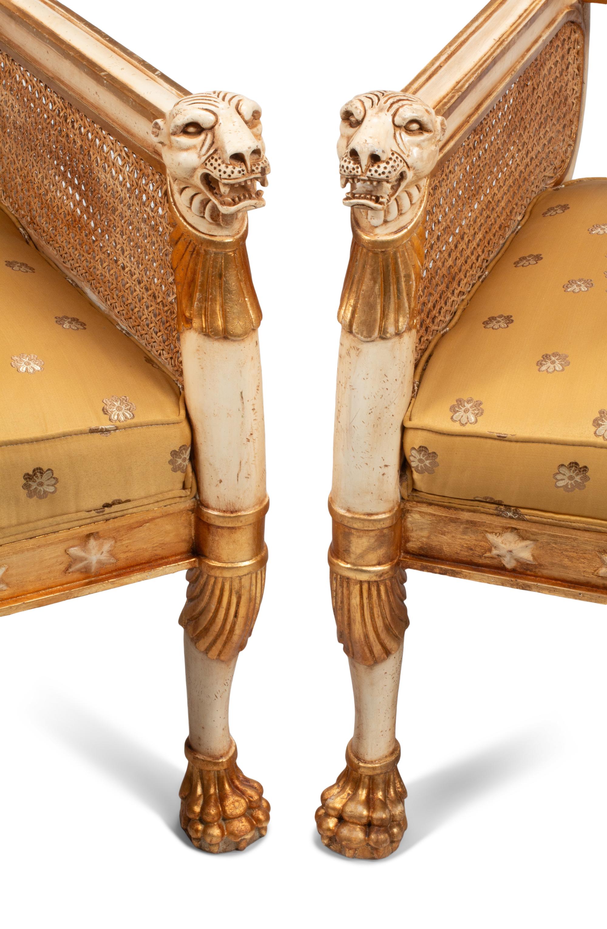A Pair of Italian Neoclassical Style Painted and Parcel-Gilt Armchairs