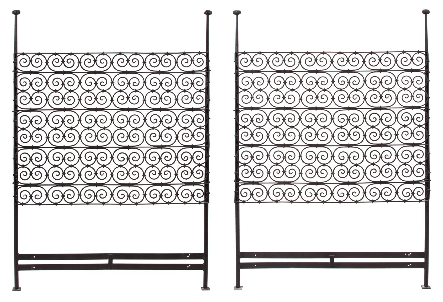 A Pair of Wrought Iron Scrollwork Twin Headboards Height 66 inches.