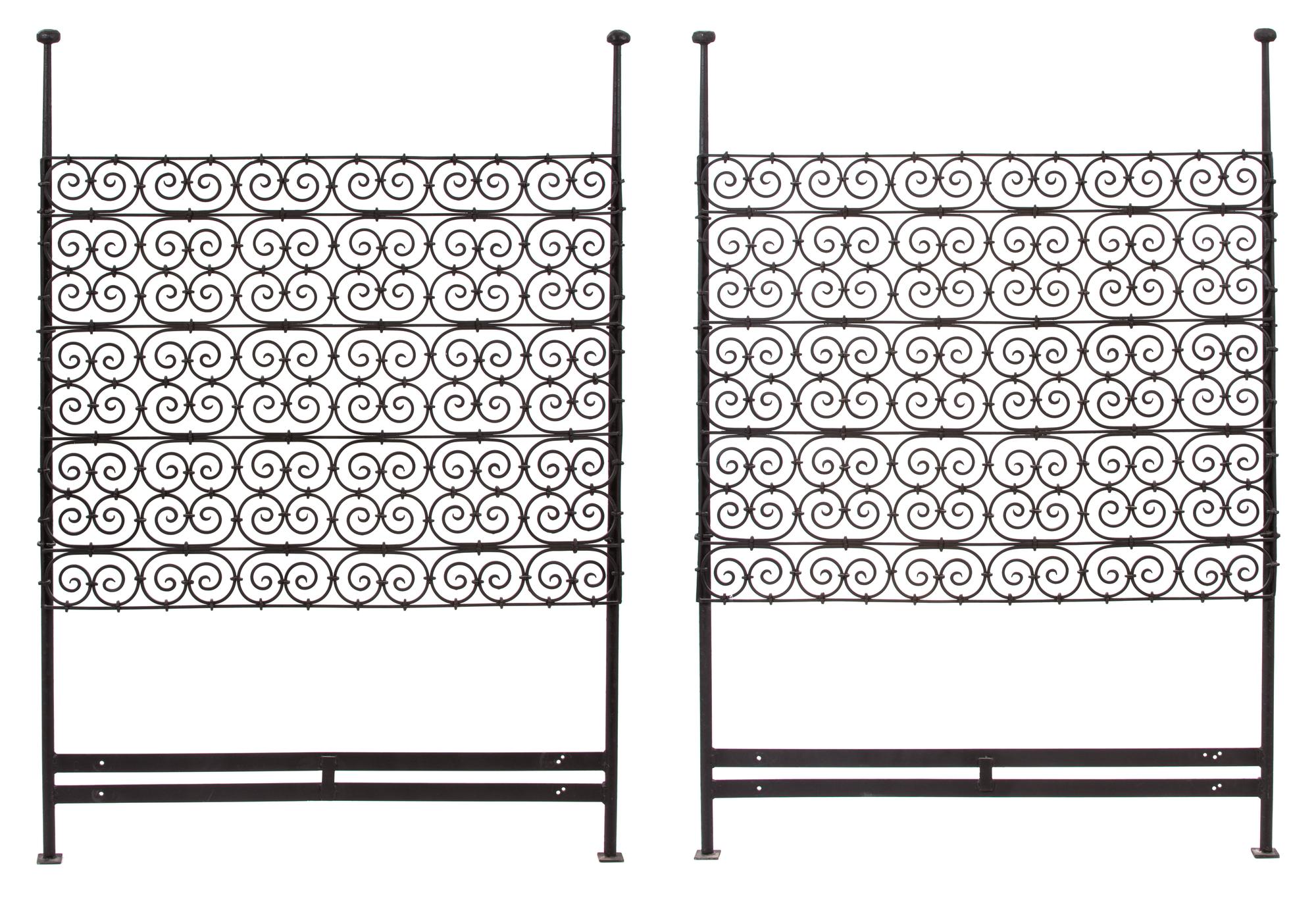 A Pair of Wrought Iron Scrollwork Twin Headboards Height 66 inches.