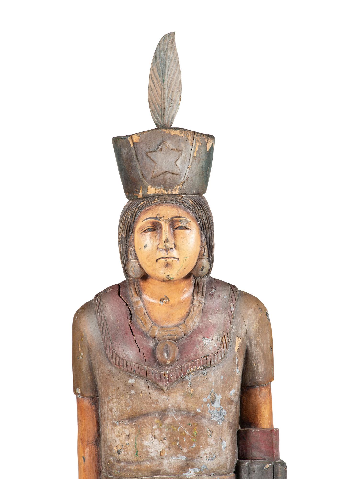A Carved and Painted Wood Tobacco Trade Figure of a Native American