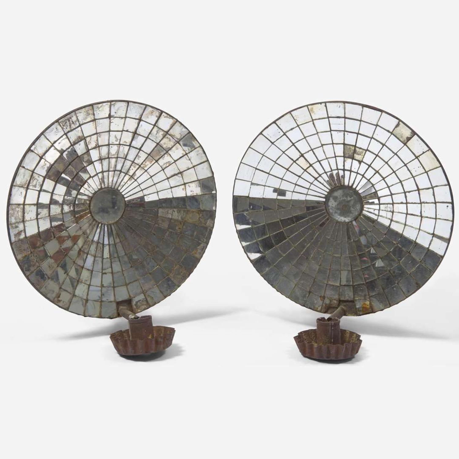 A pair of mirrored tinware sconces 19th century