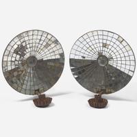 A pair of mirrored tinware sconces 19th century