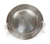 A Garrard & Co Silvered Figural Standing Salt and an Asprey Silver Bonnie Doon Commemorative Ashtray
