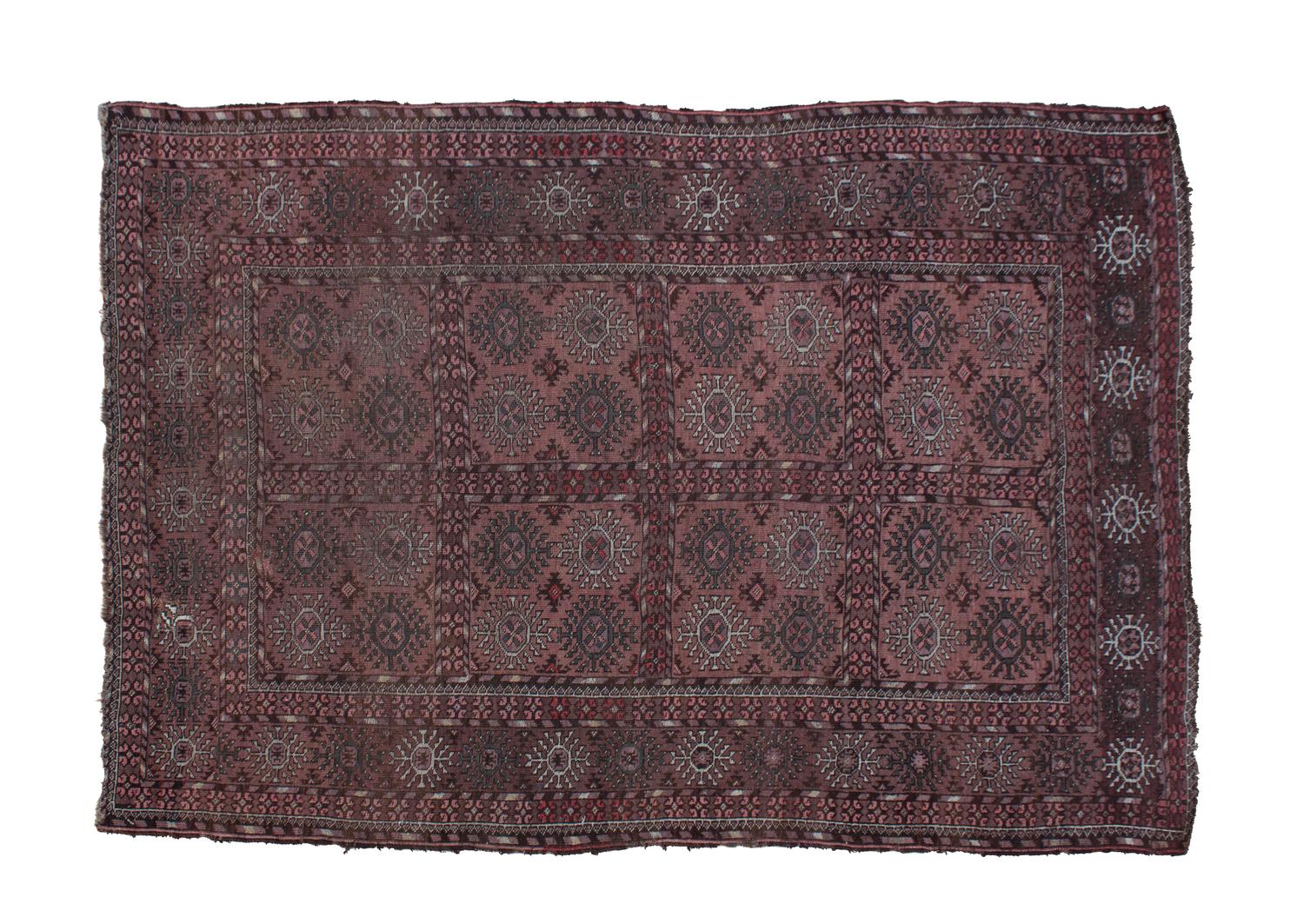 A Persian Wool Rug 6 feet 11 inches x 4 feet 7 inches.