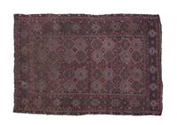 A Persian Wool Rug 6 feet 11 inches x 4 feet 7 inches.