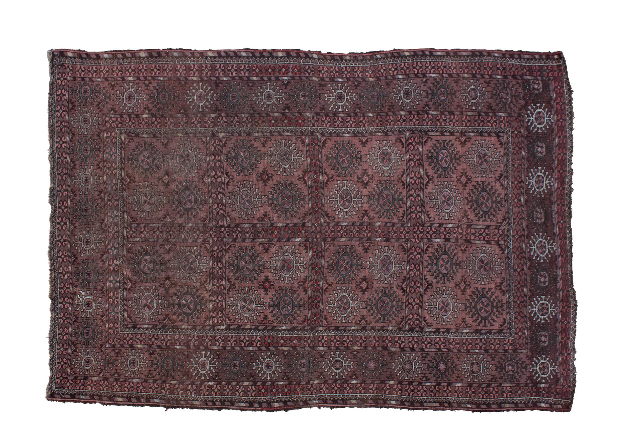 A Persian Wool Rug 6 feet 11 inches x 4 feet 7 inches.