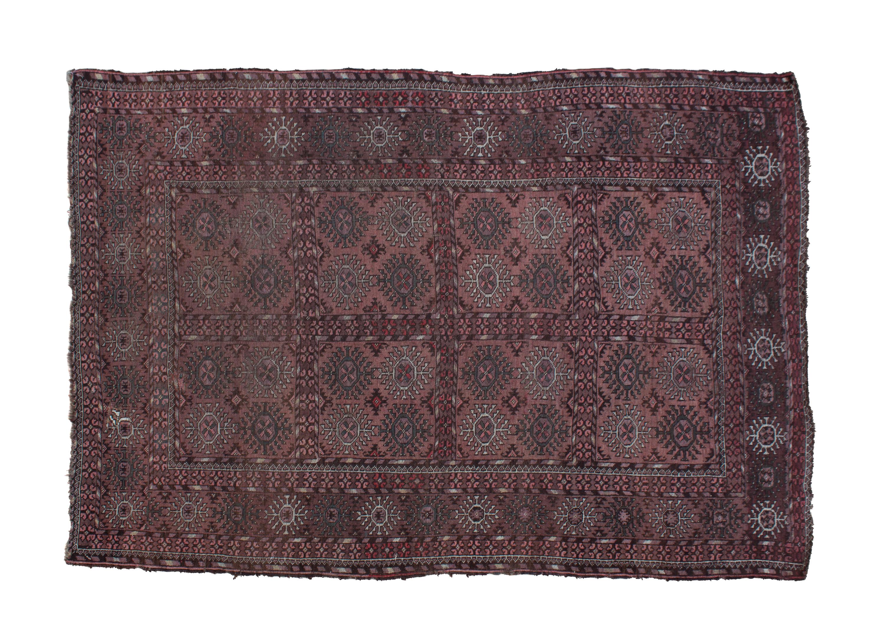 A Persian Wool Rug 6 feet 11 inches x 4 feet 7 inches.