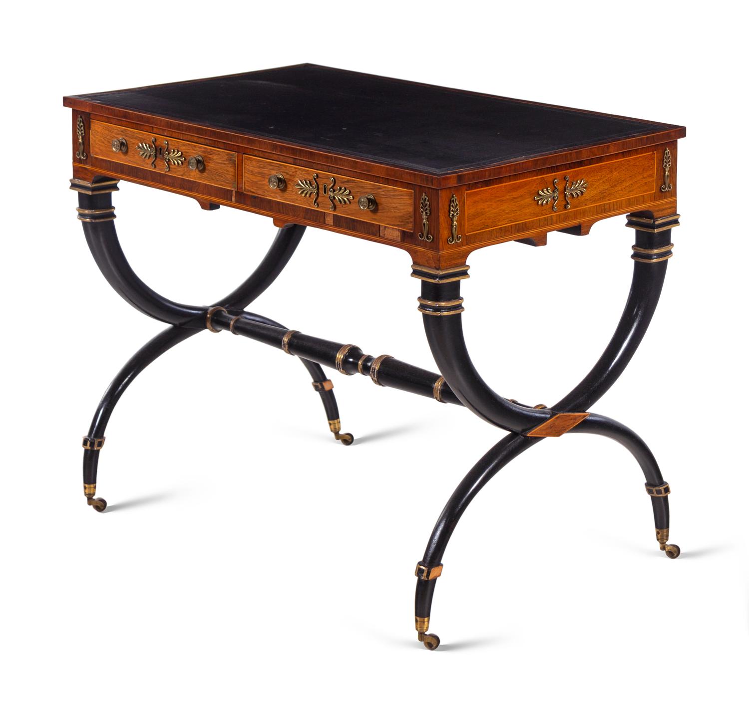 A Regency Gilt Bronze Mounted, Parcel Ebonized and Parcel Gilt Rosewood Writing Table