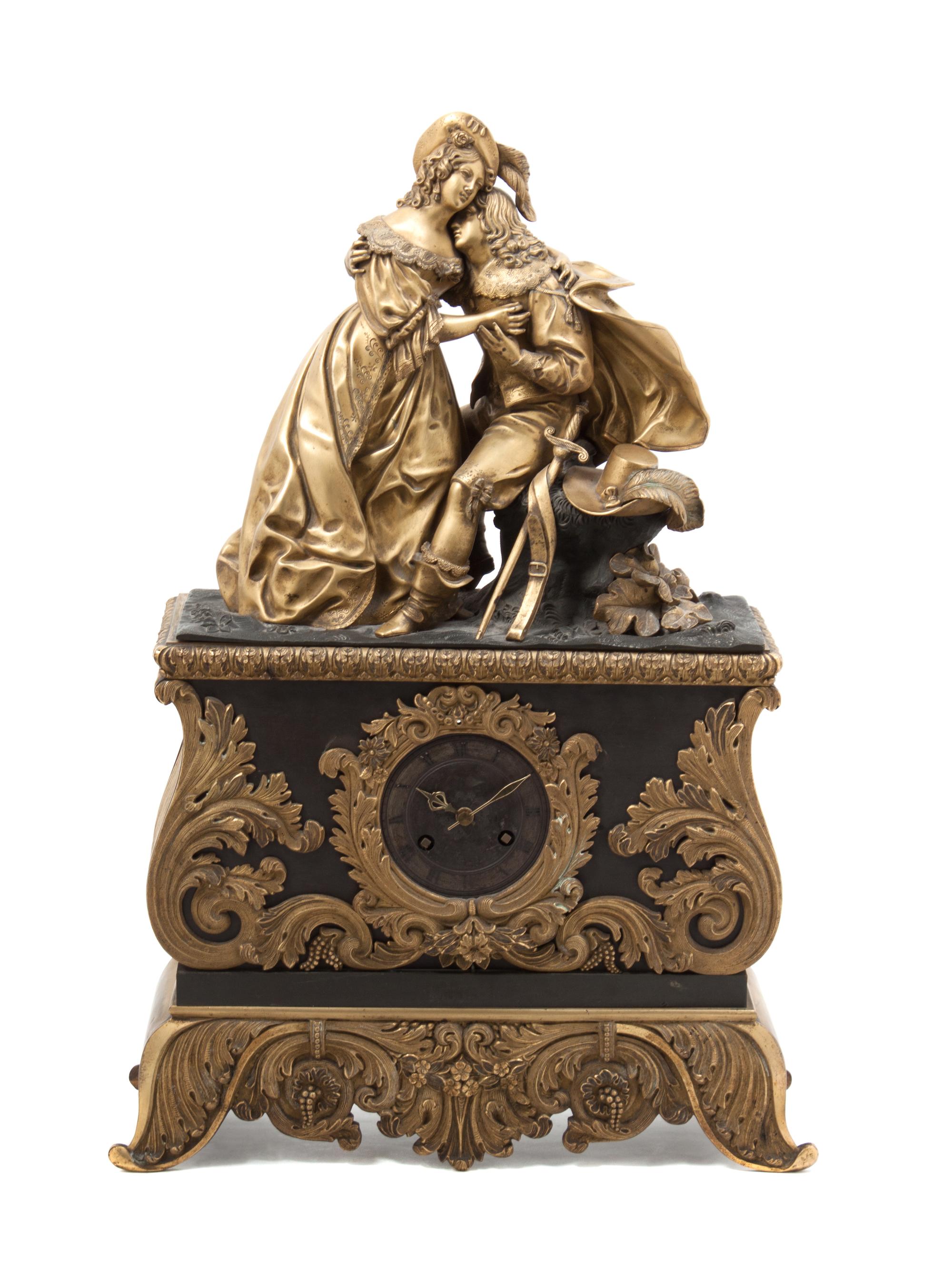 An Empire Gilt and Patinated Bronze Figural Mantel Clock Height 21 3/4 inches.