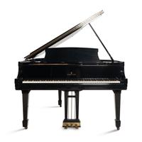 A Steinway and Sons Baby Grand Piano