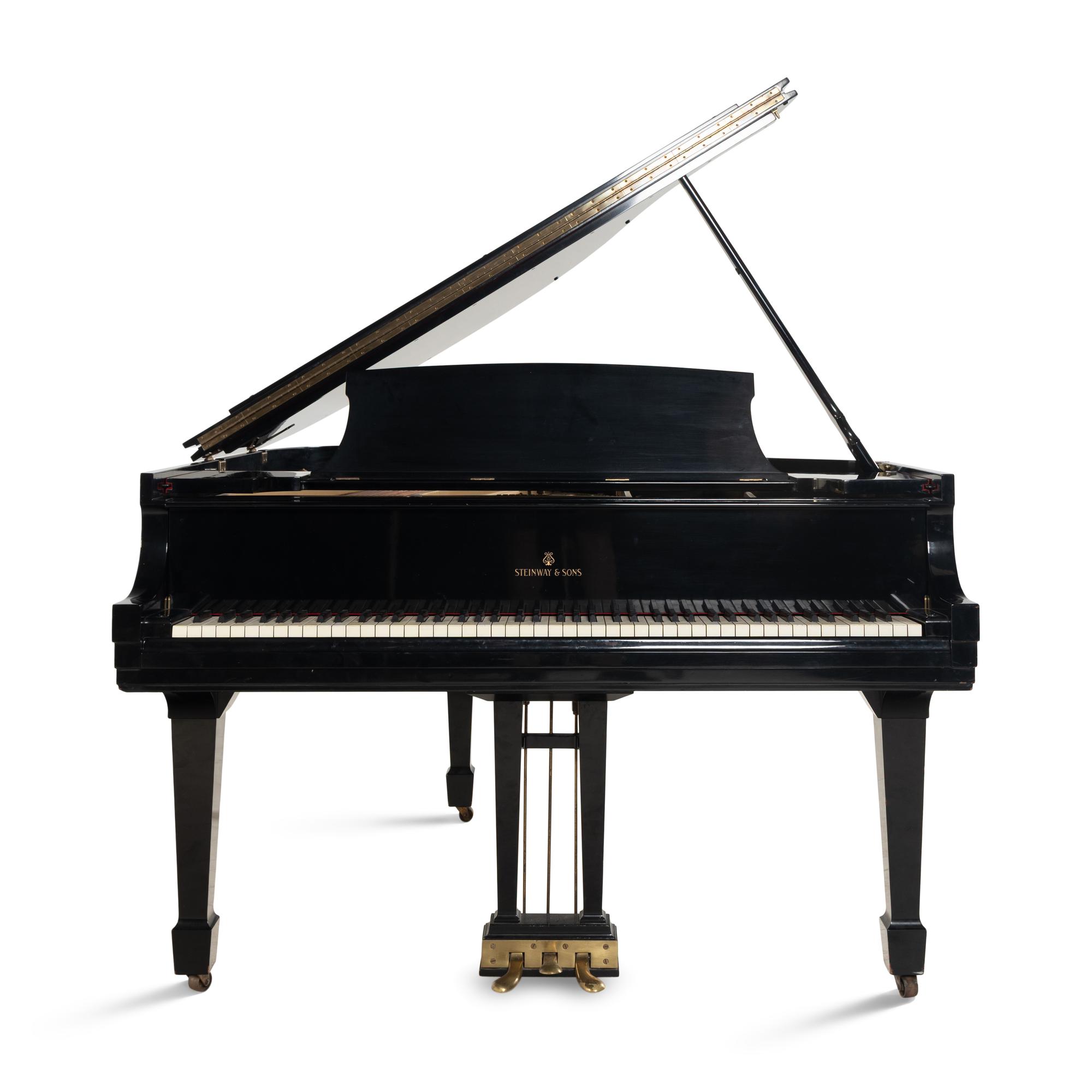 A Steinway and Sons Baby Grand Piano