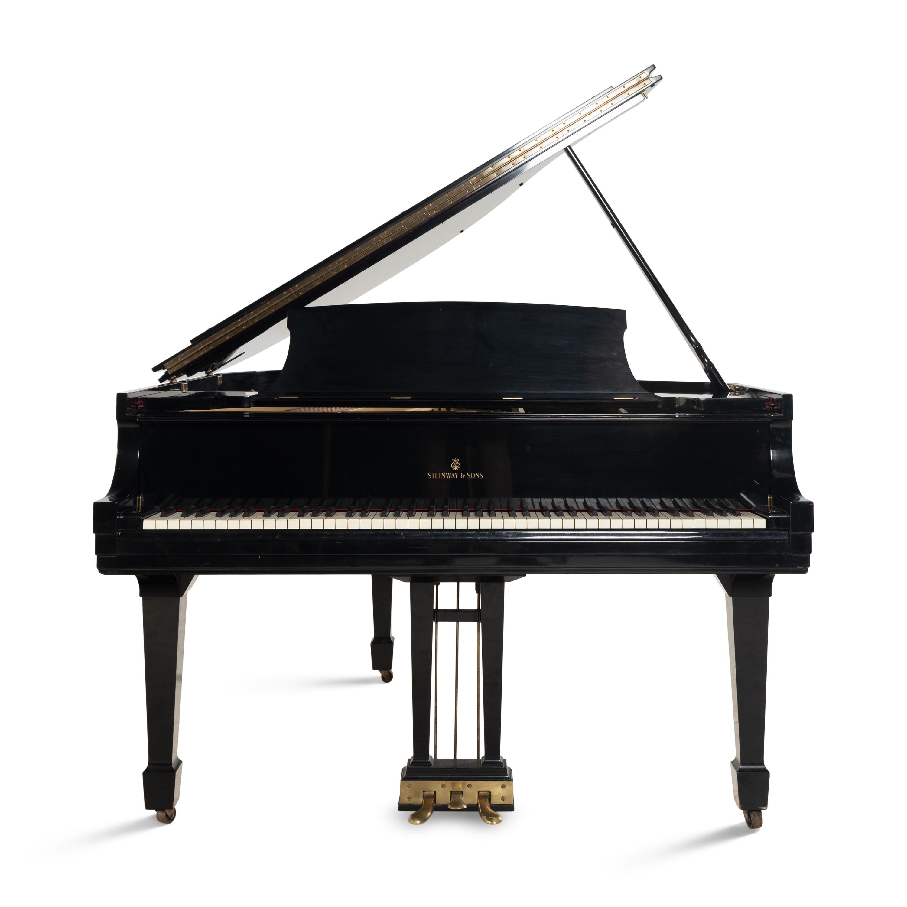 A Steinway and Sons Baby Grand Piano