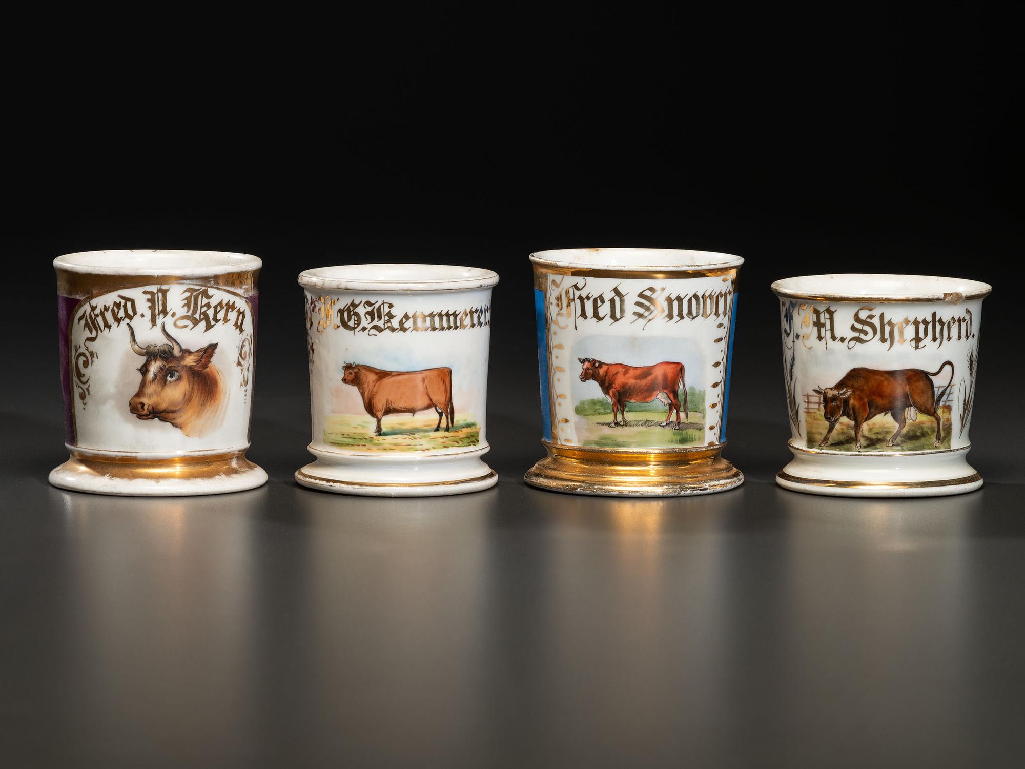 Four Porcelain Occupational Shaving Mugs of Bovine Interest