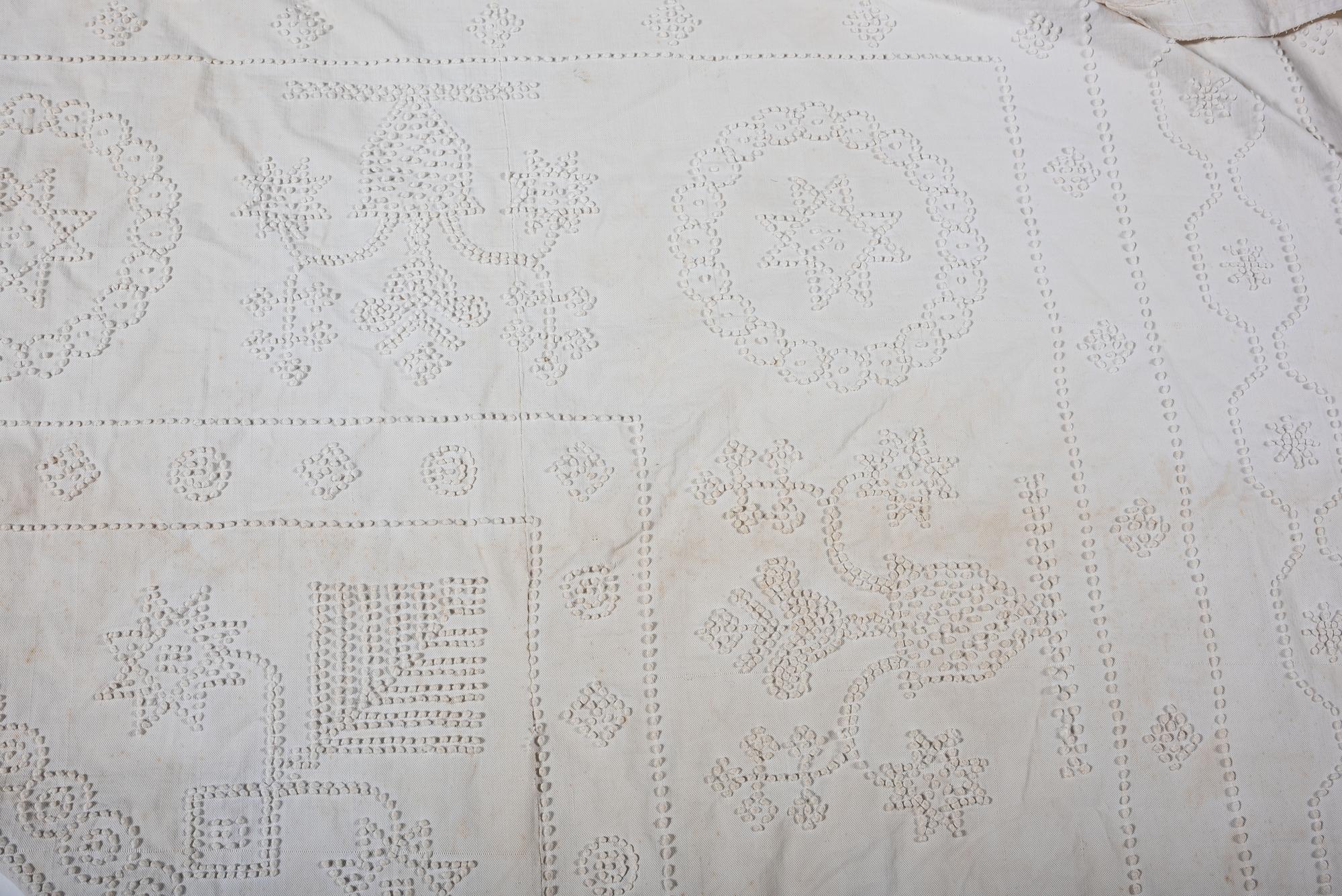 Two Whitework Bed Covers