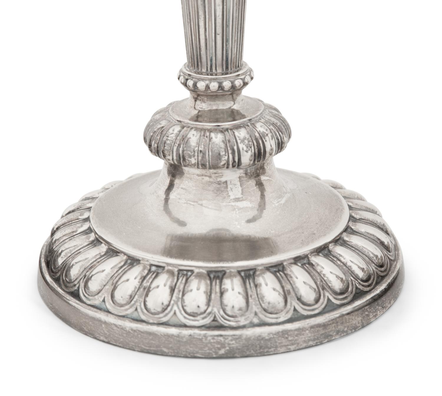 A Set of Four Victorian Silver Candlesticks